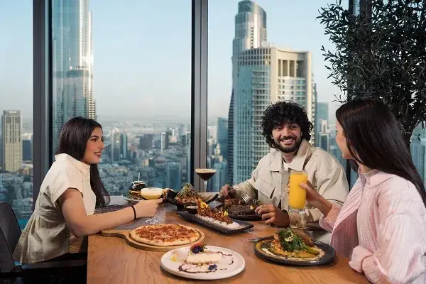 Dining with city skyline view.